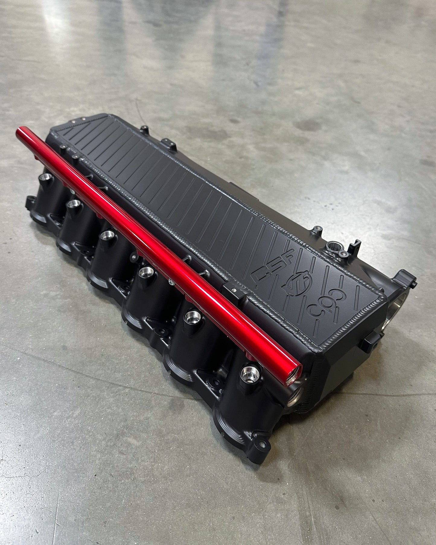 CSF #8200C A90 Supra / BMW B58 Charge-Air Cooler Manifold - Custom Finish custom finish - Thermal Black Heat Dispersion with Cusco/Verus Engineering Blue Fuel Rail