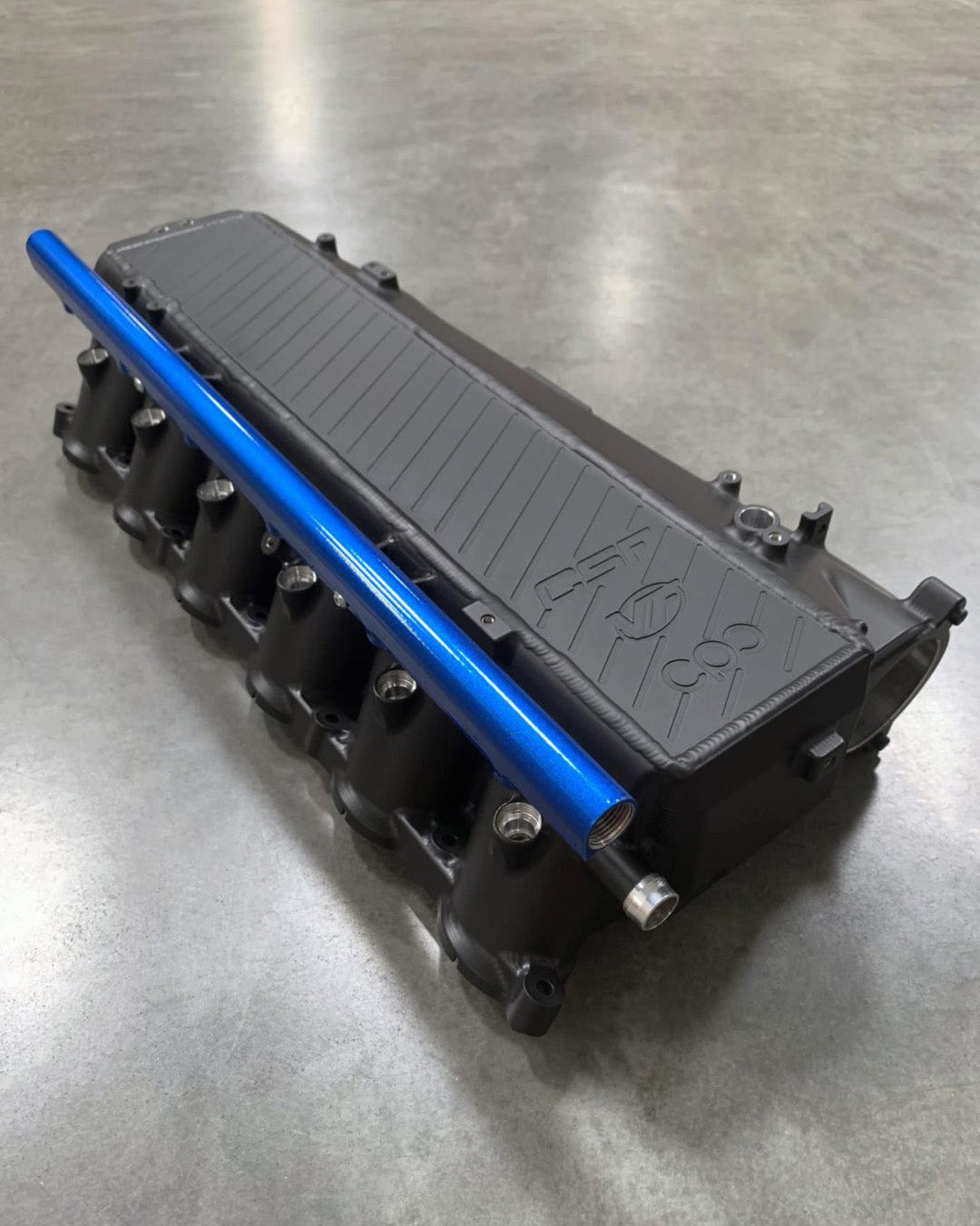 CSF #8200C A90 Supra / BMW B58 Charge-Air Cooler Manifold - Custom Finish custom finish - Thermal Black with Candy Red Fuel Rail